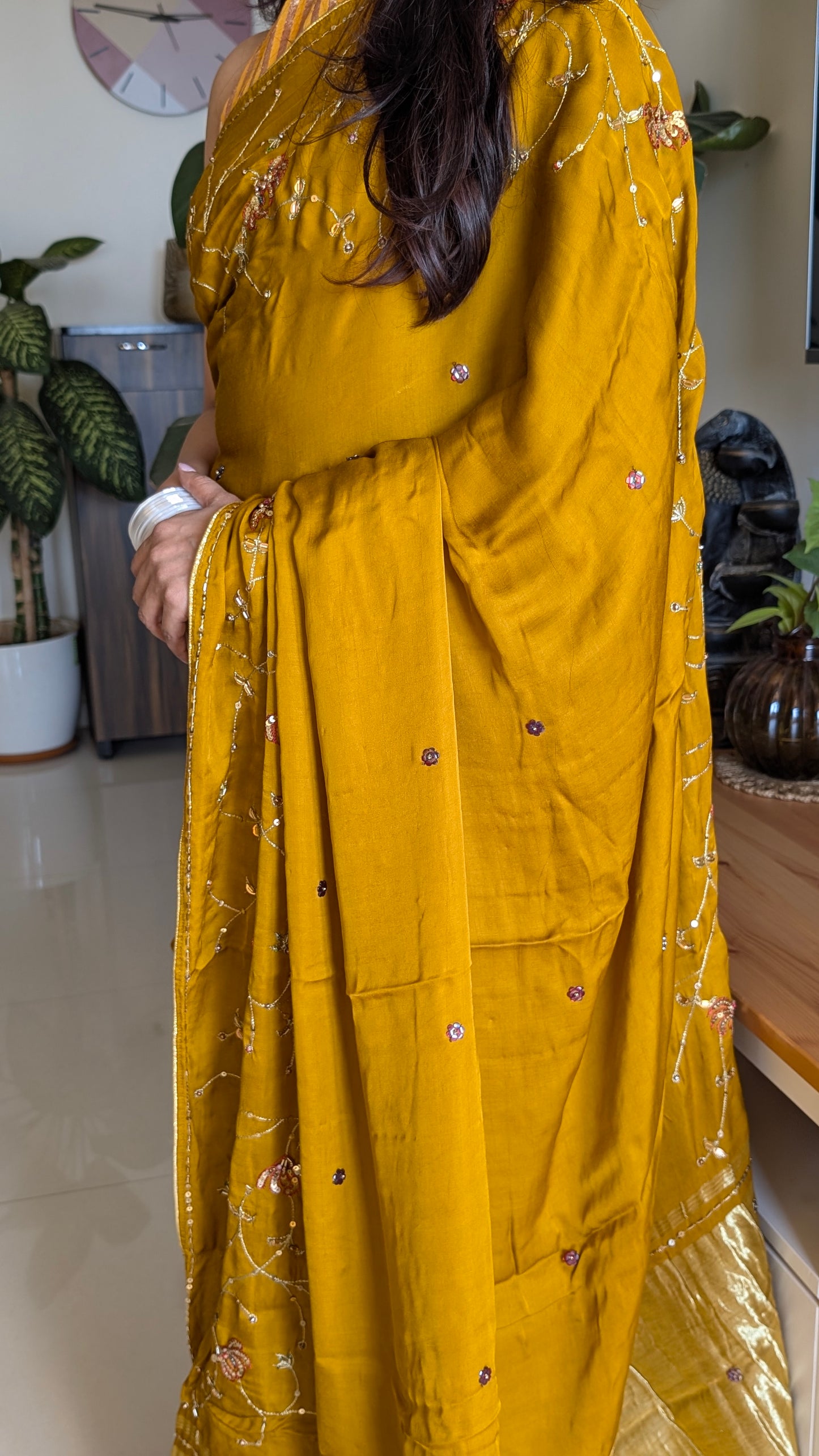 Mustard yellow modal silk saree with handwork
