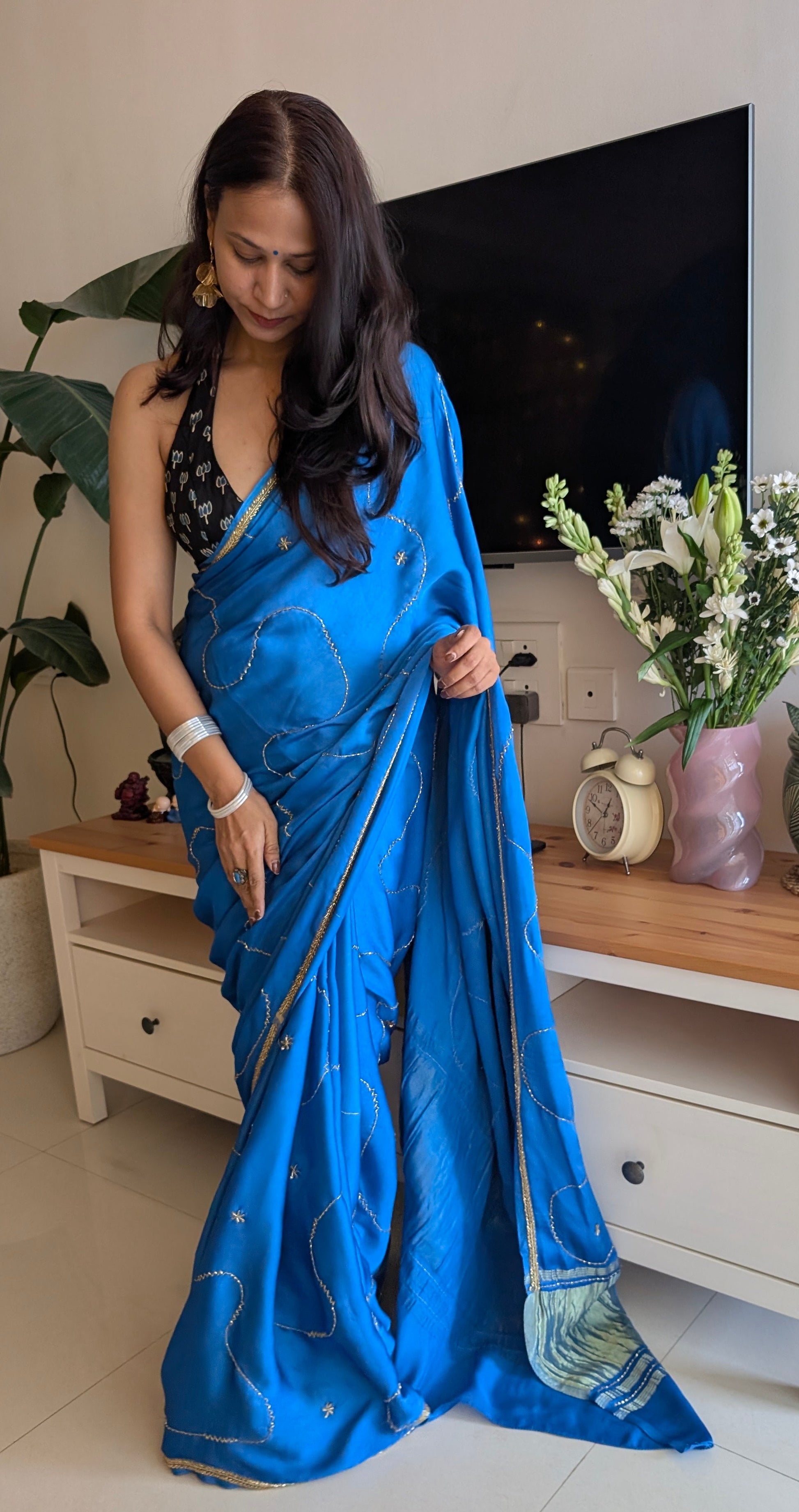 Blue modal silk saree with embroidery work in gold