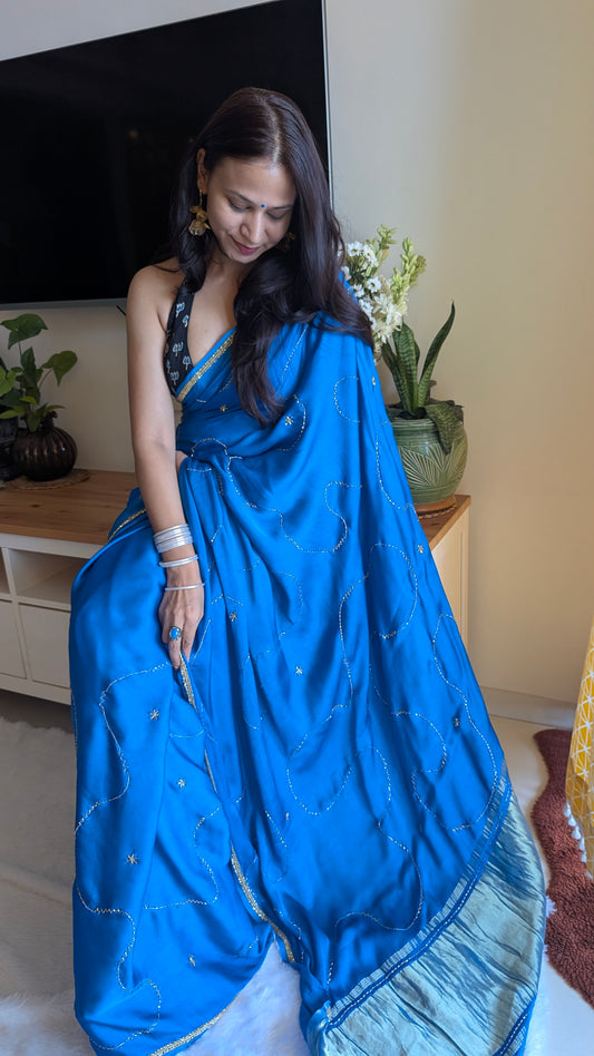 Blue Modal Silk Saree with Handwork and detailed Hand embroidery. 