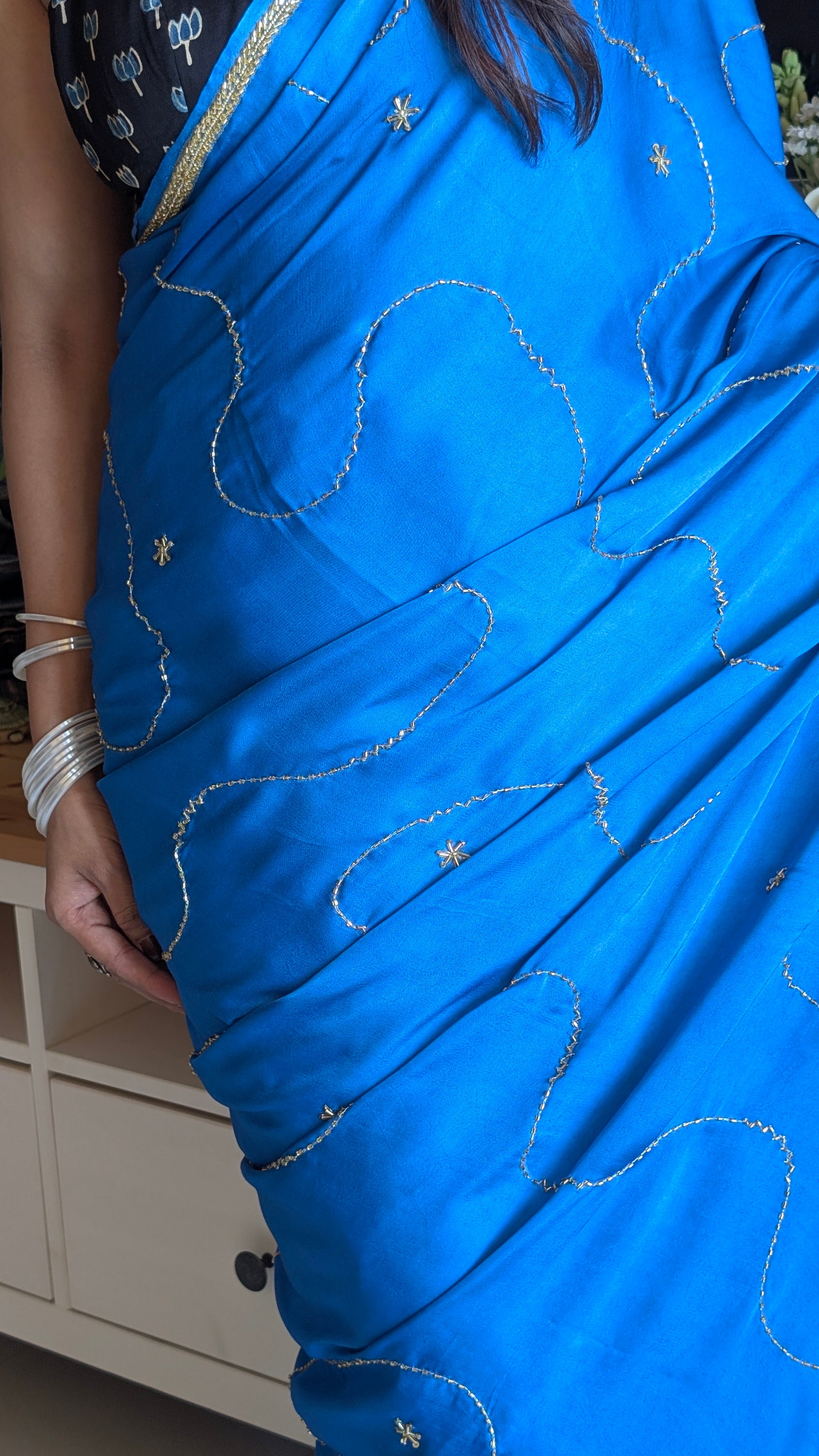 Blue modal silk saree with gold embroidery